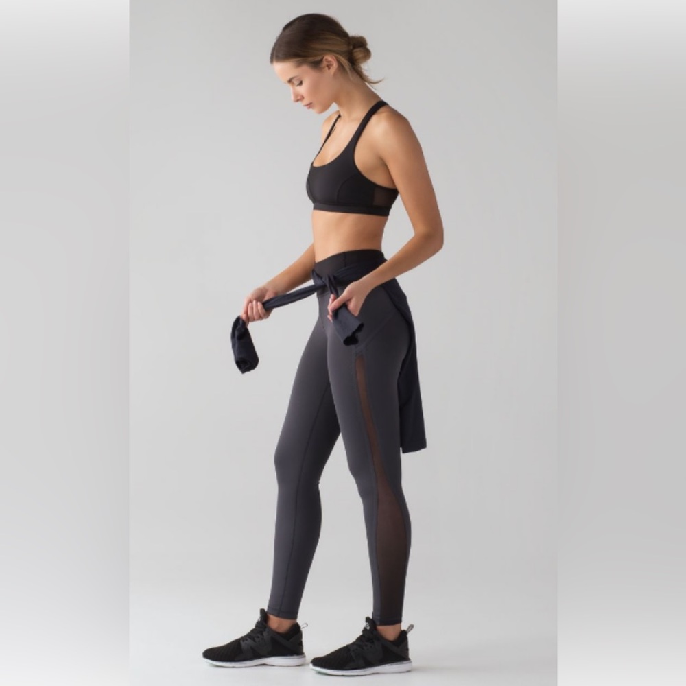 Lululemon Smooth Stride Tight.  Blue and Black.  Size 4.  Mesh on leg